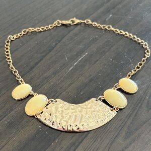 Gold-Tone Bib Necklace with Cream Cabochon Accents